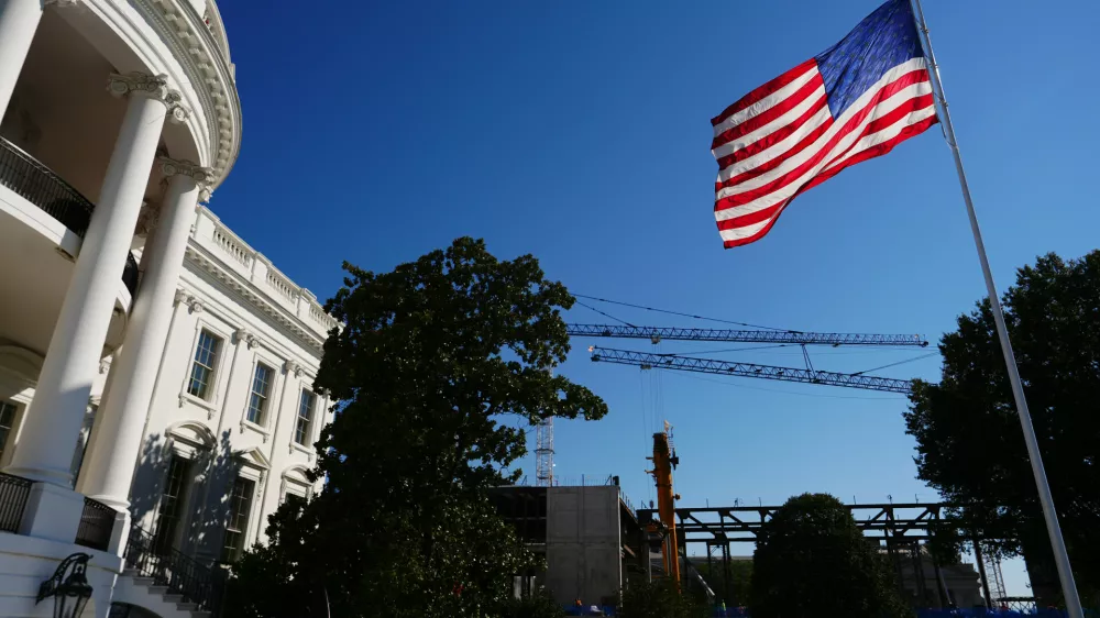 Work continues on building the White House ballroom, as seen from the South Lawn of the White House, Tuesday, Oct. 13, 2026, in Washington. (AP Photo/Julia Demaree Nikhinson)