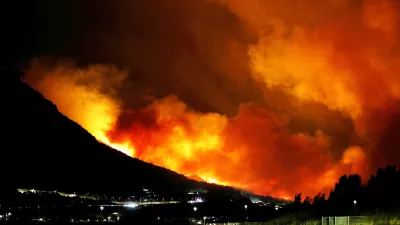 A general view of a wildfire near Omis, southern Croatia early Friday, August. 14, 2026. (AP Photo/Jakov Prkic)