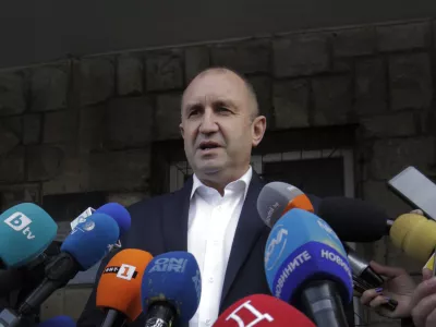 Bulgarian President Rumen Radev speaks to journalists after casting his vote in Sofia, Sunday, Nov. 21, 2021. Bulgarians are at the polls to choose a new president in a hotly contested runoff amid a COVID-19 surge and a political crisis that has gripped the European Union&acirc;&euro;&trade;s poorest country. The choice is between incumbent Rumen Radev and Sofia University rector Anastas Gerdzhikov. (AP Photo/Valentina Petrova)