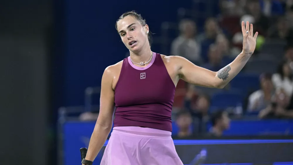 Belarus's Aryna Sabalenka reacts after a point against USA's Ann Li during their women's singles match at the Wuhan Open tennis tournament in Wuhan, in China's Hubei province on October 14, 2026.,Image: 1143276549, License: Rights-managed, Restrictions:, Model Release: no 