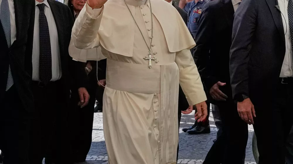 Pope Leo XIV arrives at the Agostino Gemelli Polyclinic in Rome, Tuesday, Oct. 13, 2026, where he's expected to be operated to remove a lung nodule. (AP Photo/Alessandra Tarantino)