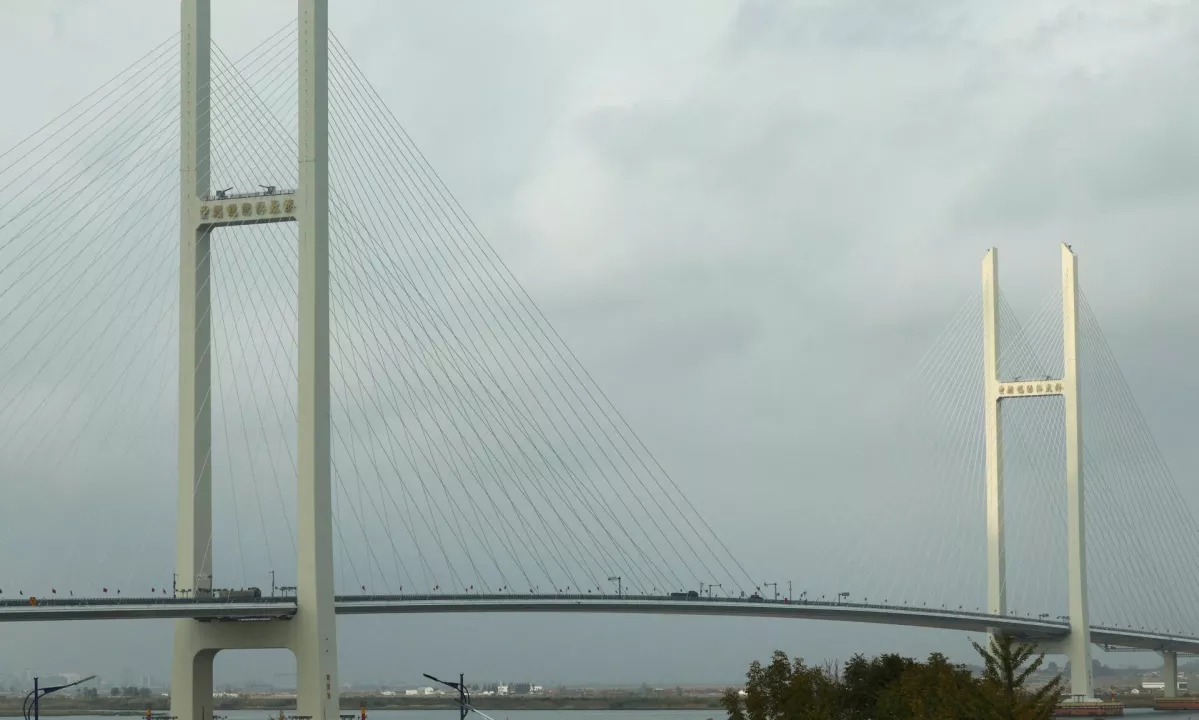 Kitajska in Severna Koreja z več kot desetletno zamudo odprli most med državama