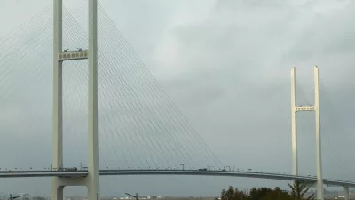 Trucks cross the newly opened New Yalu River Bridge, which connects China's Dandong New Zone and North Korea's Sinuiju, as seen from Dandong, Liaoning Province, China, October 15, 2026. REUTERS/Florence Lo