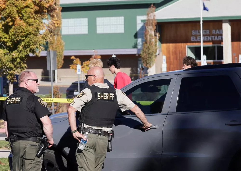 Emergency personnel work at the scene following a shooting at Silver Rail Elementary School in Bend, Oregon, US, October 15, 2026.  REUTERS/Rob Kerr