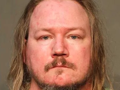 FILE - This booking photo provided by the Des Moines, Iowa, Polk County Sheriff's Office shows Sean Gardner on Aug. 14, 2025. (Polk County Sheriff's Office via AP, File)
