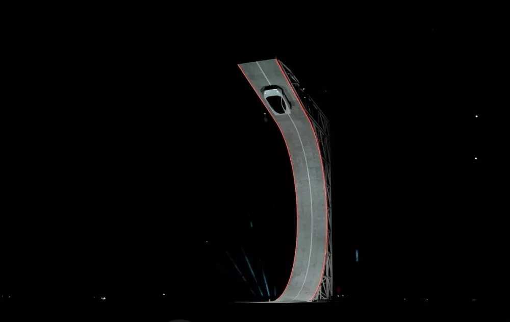 Tesla unveils its long-delayed Roadster nearly a decade after first revealing a next-generation version of its original electric sports ​car, at a launch event in Waco, Texas, US, on October 15, 2026, in this still image taken from a handout video. Tesla/Handout via REUTERS THIS IMAGE HAS BEEN SUPPLIED BY A THIRD PARTY. NO RESALES. NO ARCHIVES. MANDATORY CREDIT.