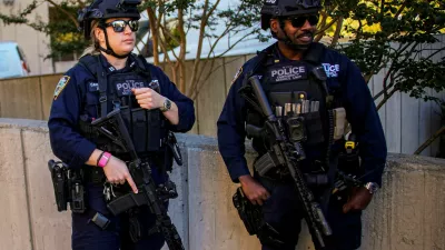 New York City Police Department (NYPD) Emergency Service Unit officers stand guard near the Daniel Patrick Moynihan United States Courthouse before the departure of a motorcade carrying Venezuelan President Nicolas Maduro and his wife, Cilia Flores, after they faced a new indictment accusing them of torturing political opponents and U.S. citizens to retain their grip on power, in New York City, US, October 15, 2026. REUTERS/Eduardo Munoz