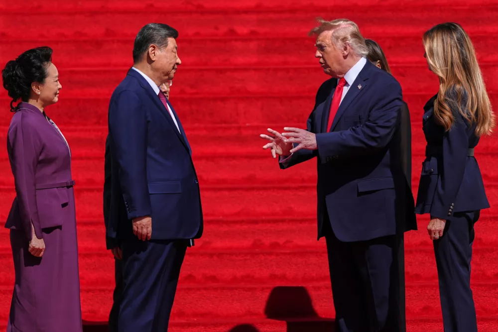 President Donald Trump, center right, and first lady Melania Trump, right, speak with China's President Xi Jinping, center left, and his wife Peng Liyuan&nbsp;on the steps of the National Archives Museum, Friday, Sept. 25, 2026, in Washington. (AP Photo/Julia Demaree Nikhinson)