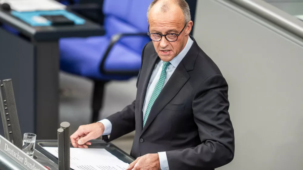 German Chancellor Friedrich Merz speaks during a meeting of the German federal parliament, Bundestag, at the Reichstag building in Berlin, Germany, Wednesday, Oct. 14, 2026. (Michael Kappeler/dpa via AP)