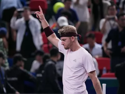 Spain's Alejandro Davidovich Fokina celebrates after winning the men's singles semifinal match against Germany's Alexander Zverev at the Shanghai Masters tennis tournament in Shanghai, China, Saturday, Oct. 17, 2026. (AP Photo/Andy Wong)