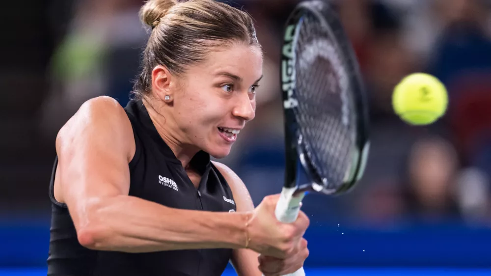 Maja Chwalinska of Poland returns the ball against her compatriot Iga Swiatek in a women's singles semifinal match during the 2026 Wuhan Open tennis tournament in Wuhan in central China's Hubei Province on Saturday, Oct. 17, 2026. (Chinatopix Via AP) 