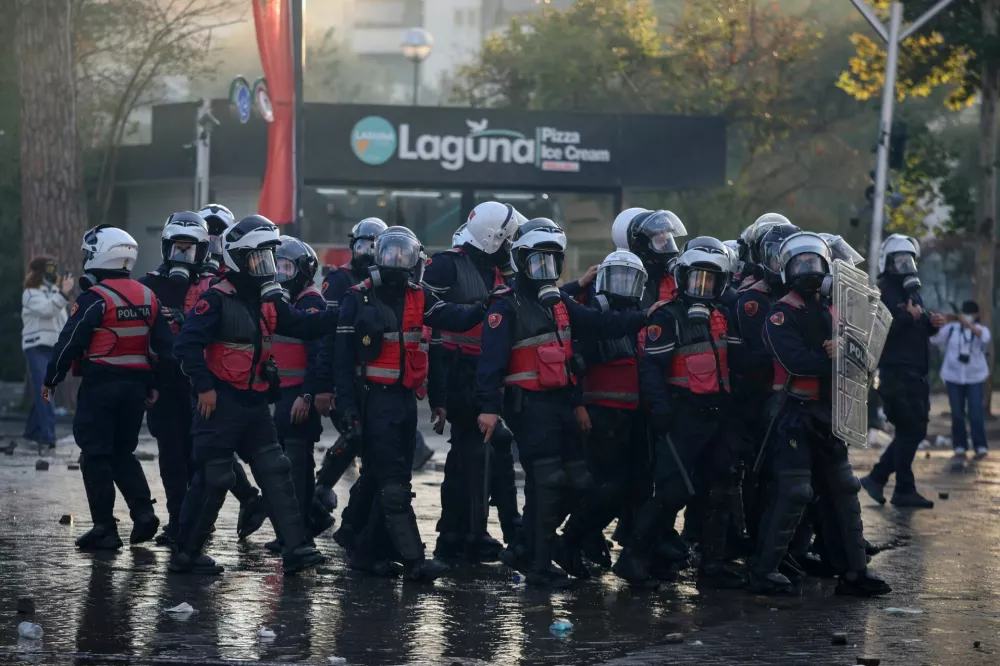 Police officers in riot gear gather during an anti-government protest by students in Tirana, Albania, October 17, 2026. REUTERS/Louisa Gouliamaki