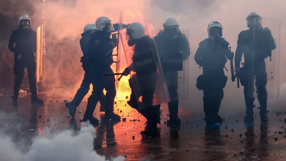 Police officers in riot gear gather during an anti-government protest by students in Tirana, Albania, October 18, 2026. REUTERS/Florion Goga