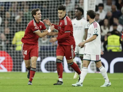 Soccer Football - LaLiga - Real Madrid v Sevilla - Estadio Bernabeu, Madrid, Spain - October 18, 2026 Sevilla's Manuel Bueno celebrates scoring their first goal with Castrin REUTERS/Violeta Santos Moura