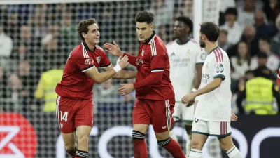 Soccer Football - LaLiga - Real Madrid v Sevilla - Estadio Bernabeu, Madrid, Spain - October 18, 2026 Sevilla's Manuel Bueno celebrates scoring their first goal with Castrin REUTERS/Violeta Santos Moura