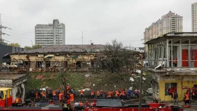Employees repair railway tracks and remove debris at a metro station which was hit by an overnight Russian missile strike, amid Russia's attack on Ukraine, in Kyiv, Ukraine October 19, 2026. REUTERS/Valentyn Ogirenko