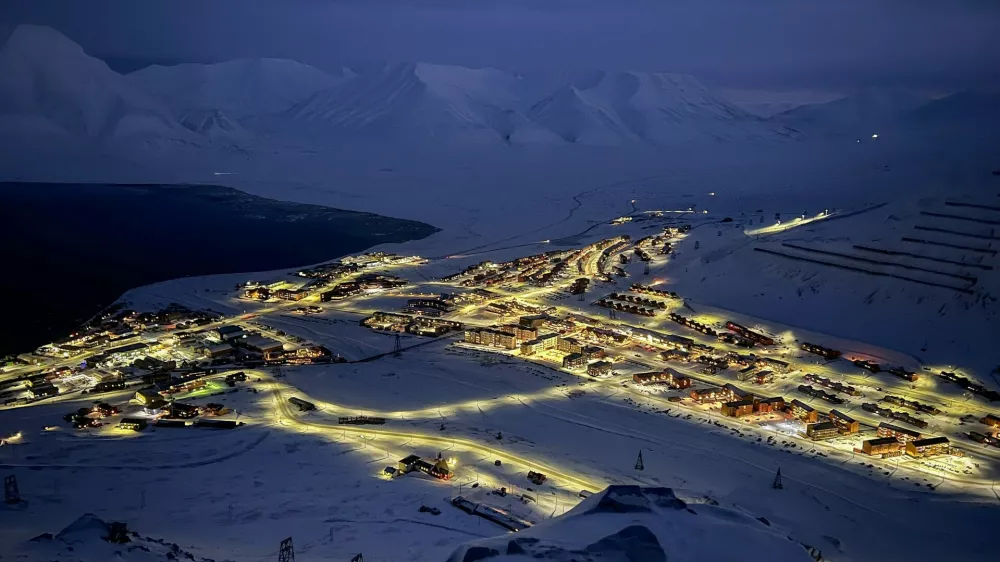 The buildings are illuninated in Longyearbyen on the Norwegian archipelago of Svalbard, a few days before the sun return, on February 8, 2026. There are no outward signs of jitters, at least not yet: people in Svalbard are going about their daily lives as normal despite speculation that this Norwegian archipelago could be the next Arctic territory coveted by the US or Russia."Today Greenland, tomorrow Svalbard?" -- Terje Aunevik, mayor of Svalbard's main town Longyearbyen, says he has been asked the question many times.,Image: 1076349507, License: Rights-managed, Restrictions: TO GO WITH AFP STORY, Model Release: no 