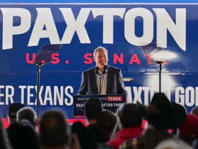 Republican U.S. Senate candidate Texas Attorney General Ken Paxton speaks to attendees as he kicks off his campaign's bus tour during an event at the Rockwall Municipal Airport Saturday, Oct. 17, 2026, in Rockwall, Texas. (AP Photo/Tony Gutierrez)