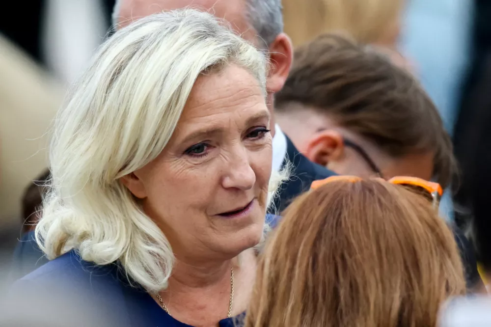Marine Le Pen, French far-right leader and member of parliament in Place de la Concorde, Paris before the arrival of Pope Leo to celebrate an open-air Mass as part of his four-day apostolic journey to France, September 26, 2026. REUTERS/Sarah Meyssonnier