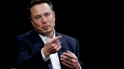 FILE PHOTO: FILE PHOTO: Elon Musk, Chief Executive Officer of SpaceX and Tesla and owner of X, formerly known as Twitter, gestures as he attends the Viva Technology conference dedicated to innovation and startups at the Porte de Versailles exhibition centre in Paris, France, June 16, 2023. REUTERS/Gonzalo Fuentes/File Photo/File Photo