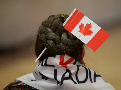 A supporter of the Forever Canadian group, who wants Alberta to remain in Canada, waits for the results of a non-binding referendum on Alberta sovereignty in Edmonton, Alberta, Canada October 19, 2026. REUTERS/Todd Korol   TPX IMAGES OF THE DAY