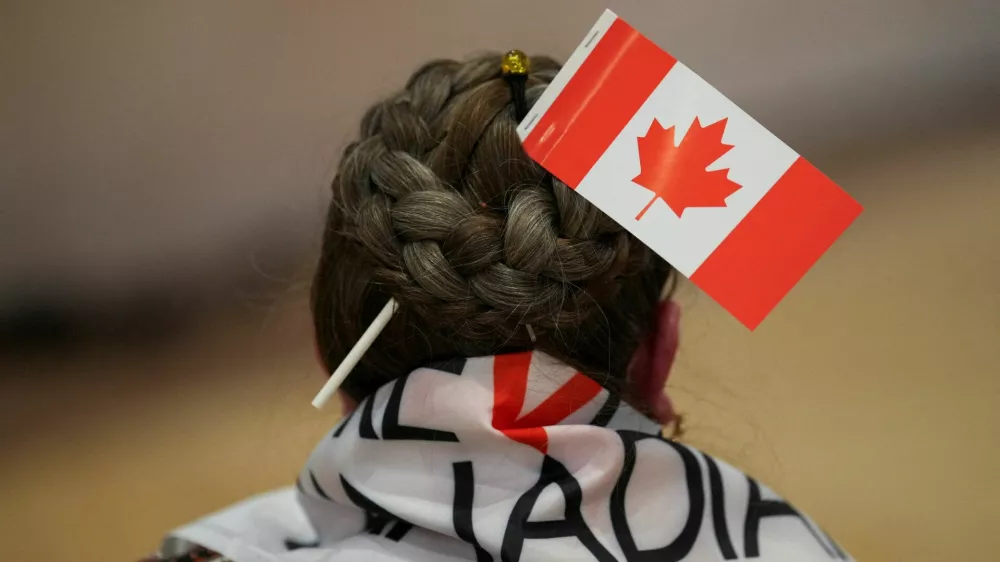 A supporter of the Forever Canadian group, who wants Alberta to remain in Canada, waits for the results of a non-binding referendum on Alberta sovereignty in Edmonton, Alberta, Canada October 19, 2026. REUTERS/Todd Korol   TPX IMAGES OF THE DAY