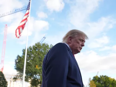 President Donald Trump walks to board Marine One on the South Lawn of the White House, Monday, Oct. 12, 2026, in Washington. (AP Photo/Julia Demaree Nikhinson)