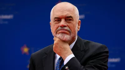 FILE PHOTO: Albanian Prime Minister Edi Rama awaits the first arrivals at the beginning of the EPC Summit in Tirana, Albania May 16, 2025.   Leon Neal/Pool via REUTERS/File Photo