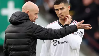 FILE PHOTO: Soccer Football - Premier League - Aston Villa v Manchester United - Villa Park, Birmingham, Britain - November 6, 2022 Manchester United manager Erik ten Hag talks to Cristiano Ronaldo before the start of the second half REUTERS/Carl Recine EDITORIAL USE ONLY. No use with unauthorized audio, video, data, fixture lists, club/league logos or 'live' services. Online in-match use limited to 75 images, no video emulation. No use in betting, games or single club /league/player publications. Please contact your account representative for further details./File Photo