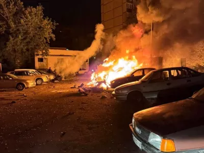 Cars burn after they were damaged by a Russian drone strike in a residential area, amid Russia's attack on Ukraine, in Kyiv, Ukraine October 21, 2026. Press service of the State Emergency Service of Ukraine in Kyiv city/Handout via REUTERS ATTENTION EDITORS - THIS IMAGE HAS BEEN SUPPLIED BY A THIRD PARTY. DO NOT OBSCURE LOGO.