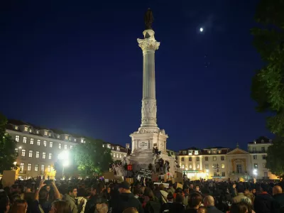 People gather to protest in Rossio Square against the housing crisis and cost of living, in Lisbon, Portugal, October 20, 2026. REUTERS/Pedro Nunes