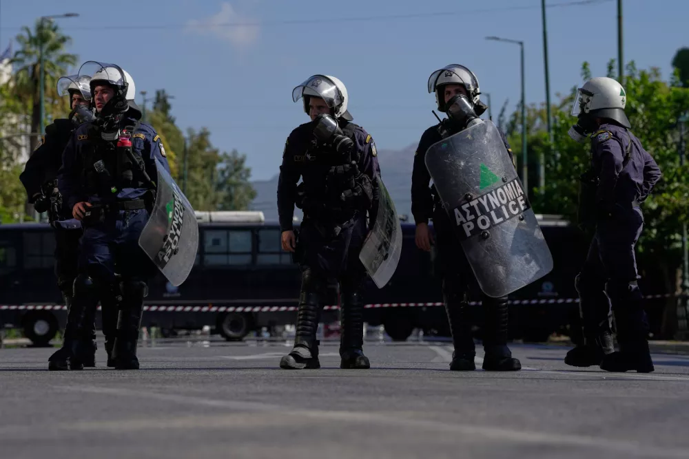Greek police during a protest organized by teachers and students demanding improvements to education and measures to address the rising cost of living in Athens, Greece, Wednesday, Oct. 21, 2026. (AP Photo/Thanassis Stavrakis)