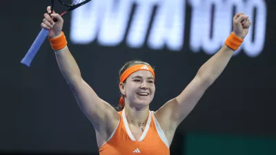 Czech Republic's Karolina Muchova reacts winning the Qatar Open tennis fina against Canada's Victoria Mboko in Doha, Qatar, on Saturday, Feb. 14, 2026. (AP Photo/Hussein Sayed)