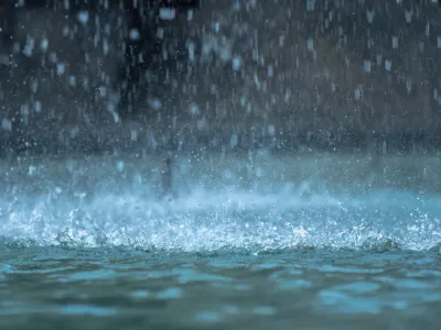 Heavy raindrops splashing on the ground