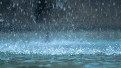 Heavy raindrops splashing on the ground