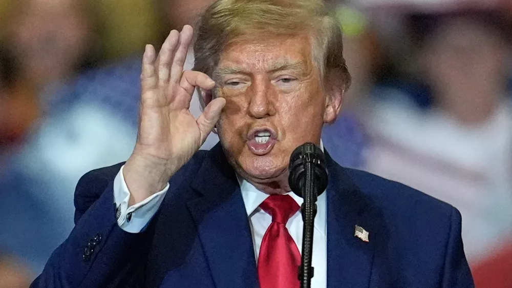 President Donald Trump speaks at a campaign rally at the T. Ed Garrison Arena, Wednesday, Oct. 21, 2026, in Pendleton, S.C. (AP Photo/Mike Stewart)