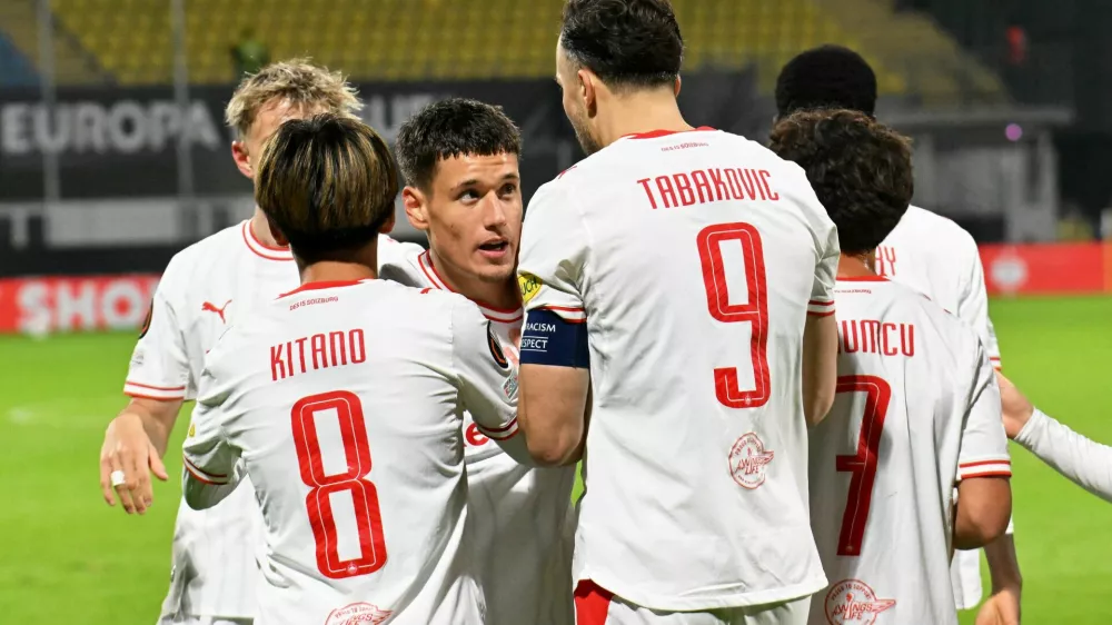 Soccer Football - UEFA Europa League - Celje v RB Salzburg - Stadion Z'dezele, Celje, Slovenia - October 22, 2026 RB Salzburg's Sota Kitano celebrates scoring their first goal with teammates REUTERS/Ziga Zivulovic Jr.