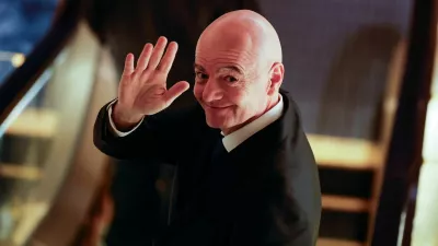 FIFA president Gianni Infantino gestures to reporters as he leaves from a venue for the Asian Football Confederation (AFC)'s extraordinary congress in Tokyo, Japan, October 23, 2026. REUTERS/Kim Kyung-Hoon