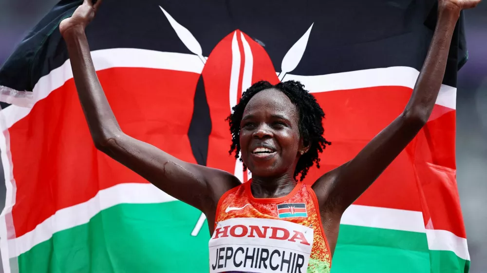 FILE PHOTO: World Athletics Championships Tokyo 2025 - Women's Marathon Final - Japan National Stadium, Tokyo, Japan - September 14, 2025 Kenya's Peres Jepchirchir celebrates after winning the Women's Marathon Final REUTERS/Sarah Meyssonnier   TPX IMAGES OF THE DAY/File Photo