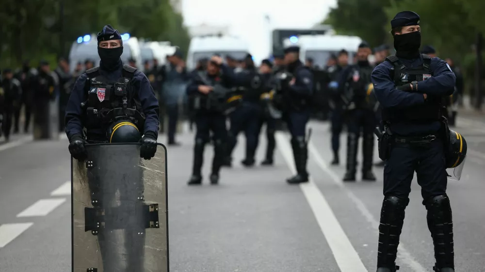Officers of the French CRS riot police stand guard during a protest organised by student collectives and trade unions in Paris, France, October 22, 2026. REUTERS/Abdul Saboor