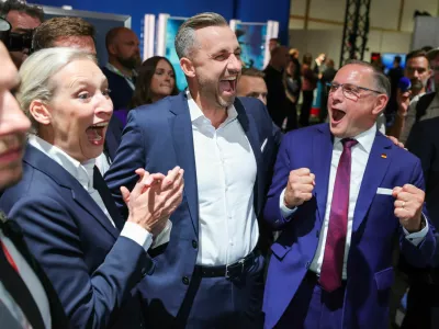 Top candidate of the far-right Alternative for Germany (AfD), Ulrich Siegmund, with party co leaders Alice Weidel and Tino Chrupalla, reacts after polls closed, on the day of the Saxony-Anhalt state elections, in Magdeburg, Germany, September 6, 2026. REUTERS/Fabrizio Bensch