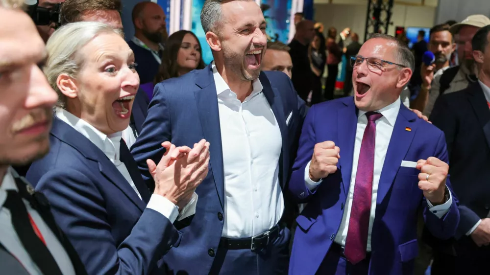 Top candidate of the far-right Alternative for Germany (AfD), Ulrich Siegmund, with party co leaders Alice Weidel and Tino Chrupalla, reacts after polls closed, on the day of the Saxony-Anhalt state elections, in Magdeburg, Germany, September 6, 2026. REUTERS/Fabrizio Bensch