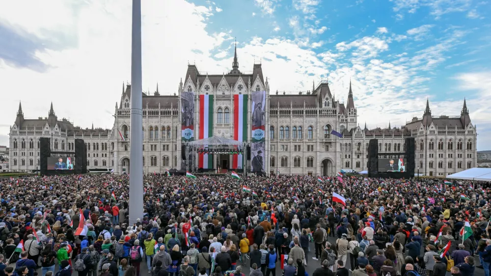 Hungarian Prime Minister Peter Magyar speaks during the commemoration of the 70th anniversary of the outbreak of the Hungarian Revolution and Freedom Fight of 1956 against Soviet oppression at the Kossuth square, in front of the Parliament in Budapest, Hungary, Friday, Oct. 23, 2026. (Boglarka Bodnar/MTI via AP)