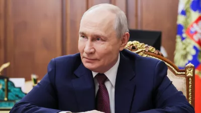 Russian President Vladimir Putin listens to Vladivostok Mayor Konstantin Shestakov during their meeting at the Kremlin in Moscow, Thursday, Oct. 22, 2026. (Mikhail Metzel/Sputnik, Kremlin Pool Photo via AP)