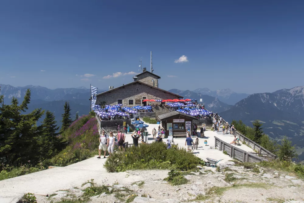 Berchtesgaden, Germany - August 13, 2015: The Kehlsteinhaus (also known as the Eagle's Nest) on top of the Kehlstein at 1.834m is the formerly Hitler's home and southern headquarters, the Eagle's Nest is located close to Berchtesgaden and unidentified people are walking along
