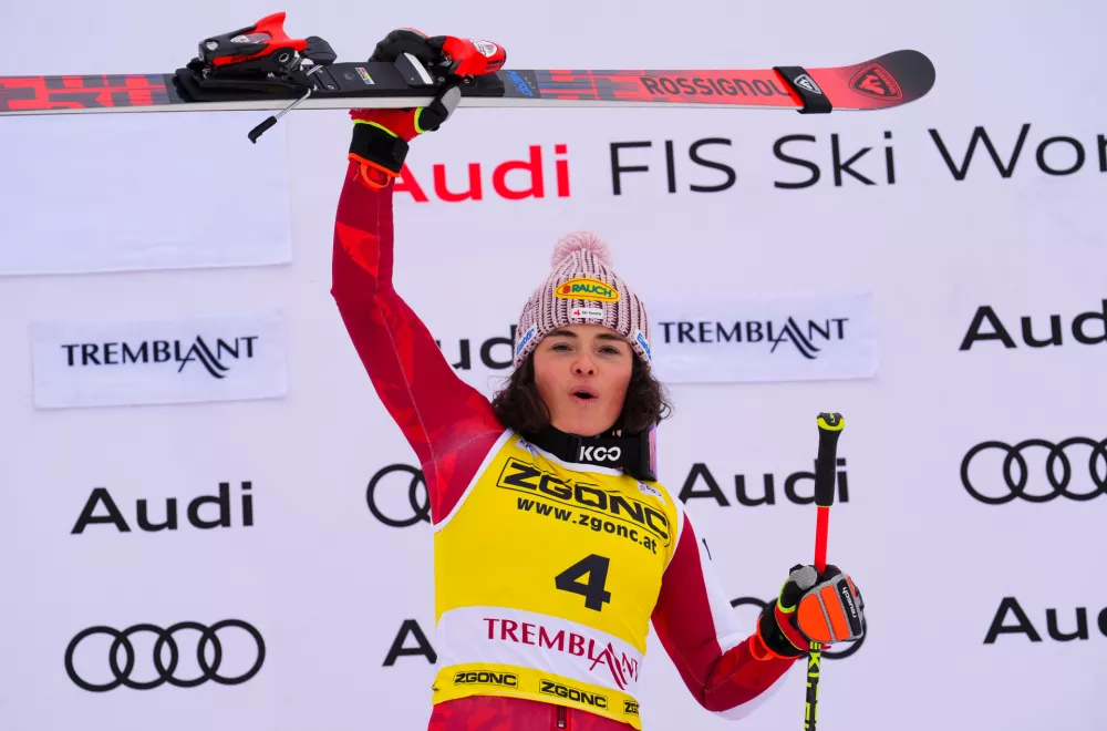 Julia Scheib, of Austria, celebrates after her victory in the women's World Cup giant slalom in Mont Tremblant, Quebec, Sunday, Dec. 7, 2025. (Sean Kilpatrick/The Canadian Press via AP)