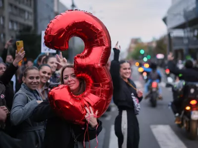 People gather for the final "Student List &ndash; Students Win" rally ahead of a parliamentary election in Belgrade, Serbia, Thursday, Oct. 22, 2026. (AP Photo/Armin Durgut)