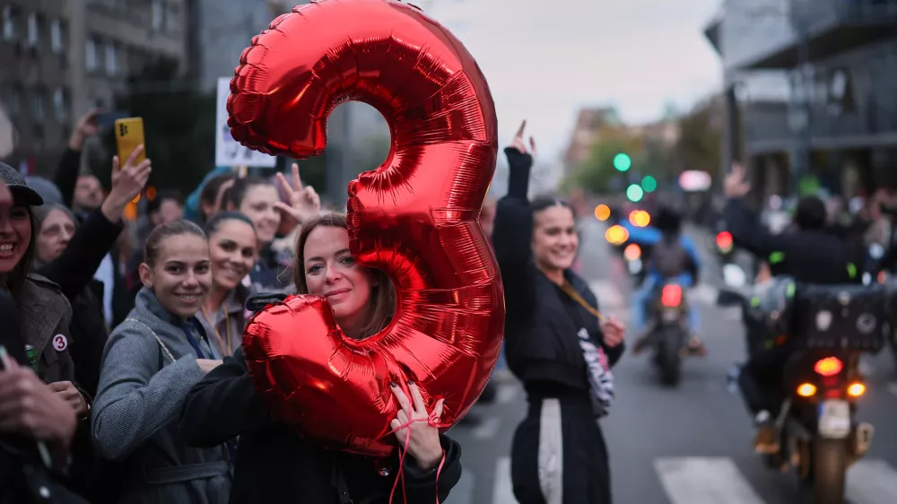 People gather for the final "Student List &ndash; Students Win" rally ahead of a parliamentary election in Belgrade, Serbia, Thursday, Oct. 22, 2026. (AP Photo/Armin Durgut)