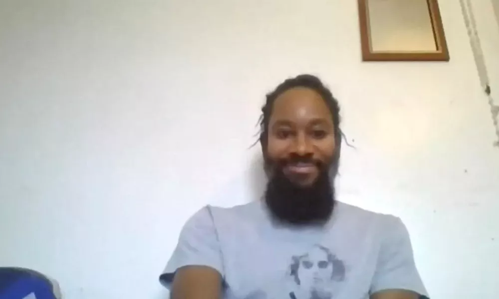 Jason Arday, a former University of Cambridge professor appears in this picture obtained from social media, released on October 9, 2020. Courtesy of Royal Borough of Greenwich via YouTube/via REUTERS THIS IMAGE HAS BEEN SUPPLIED BY A THIRD PARTY. MANDATORY CREDIT. NO RESALES. NO ARCHIVES.