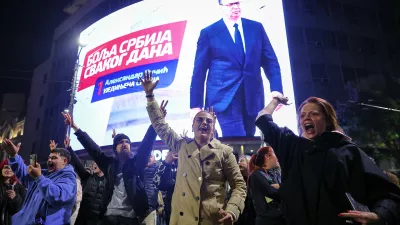 Youngsters cheer after polls closed in the parliamentary election in Belgrade, Serbia, Sunday, Oct. 25, 2026. (AP Photo/Marko Drobnjakovic)